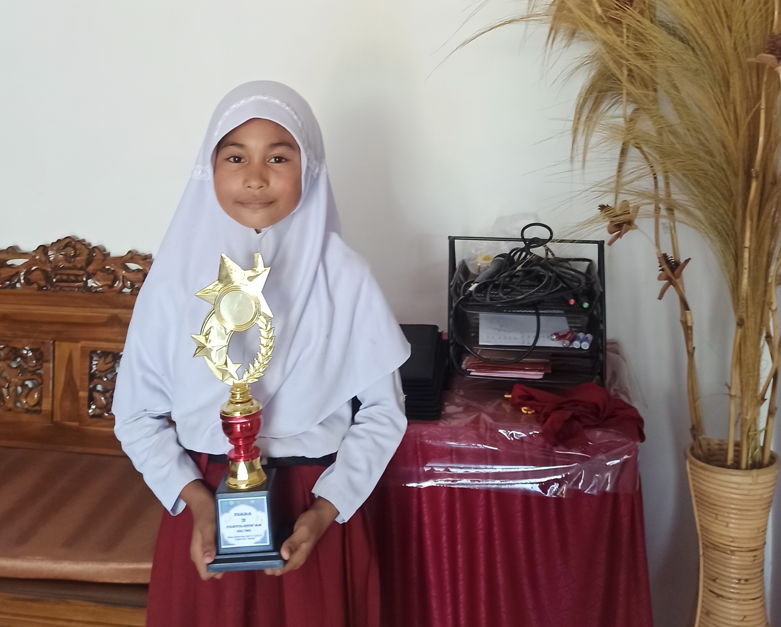 NUR HASISKA dari UPT SDN 9 BENTENG meraih juara 2 dalam lomba Keagamaan cabang lomba Tartil Qur'an tingkat Kecamatan Baranti 